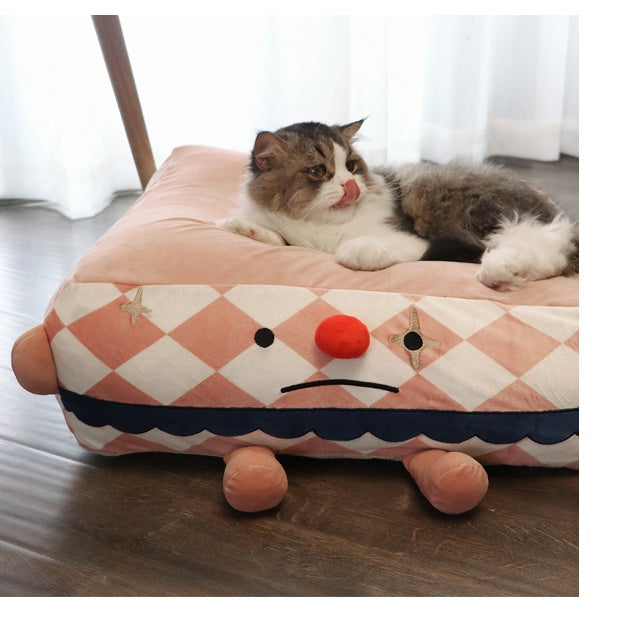 Clown In A Cozy Pet Bed