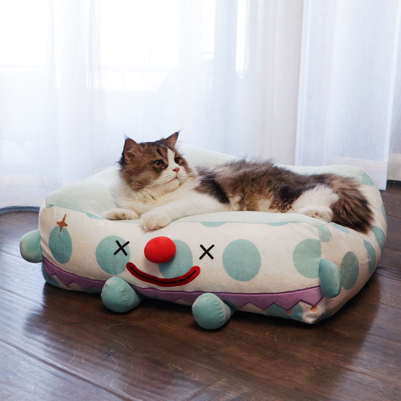 Clown In A Cozy Pet Bed